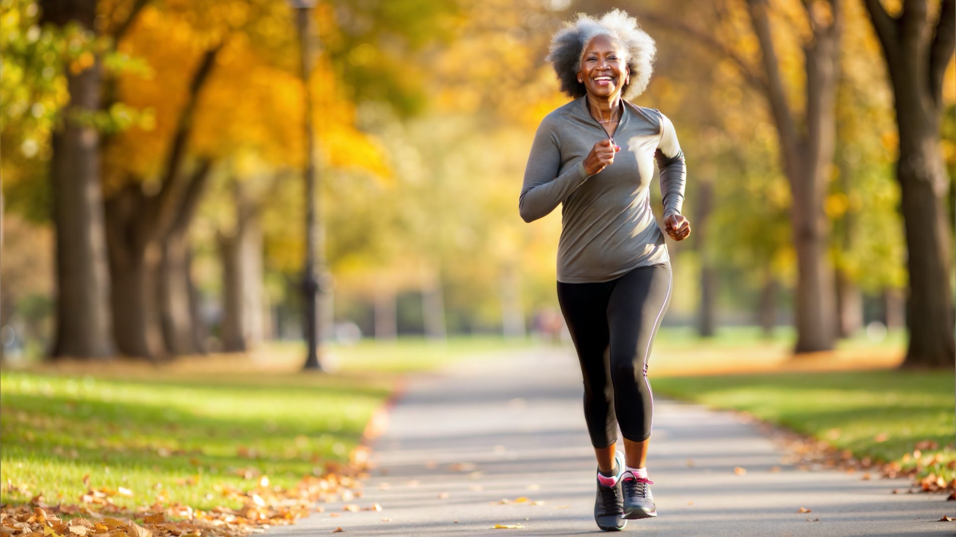 Active senior woman running outdoors pain-free after non-surgical Knee Rejuvenation Therapy in Fayetteville Arkansas